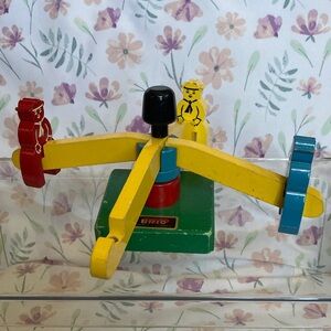 Vintage BRIO wooden toy carousel painted wooden figurines.